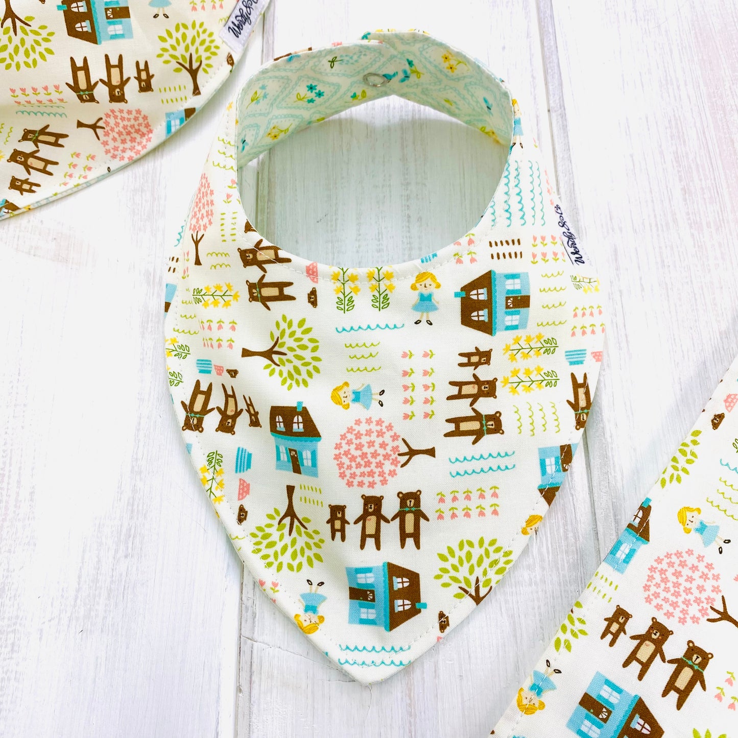 Reversible bandana baby bib, handmade, with beautiful scene- Goldilocks and the three bears.