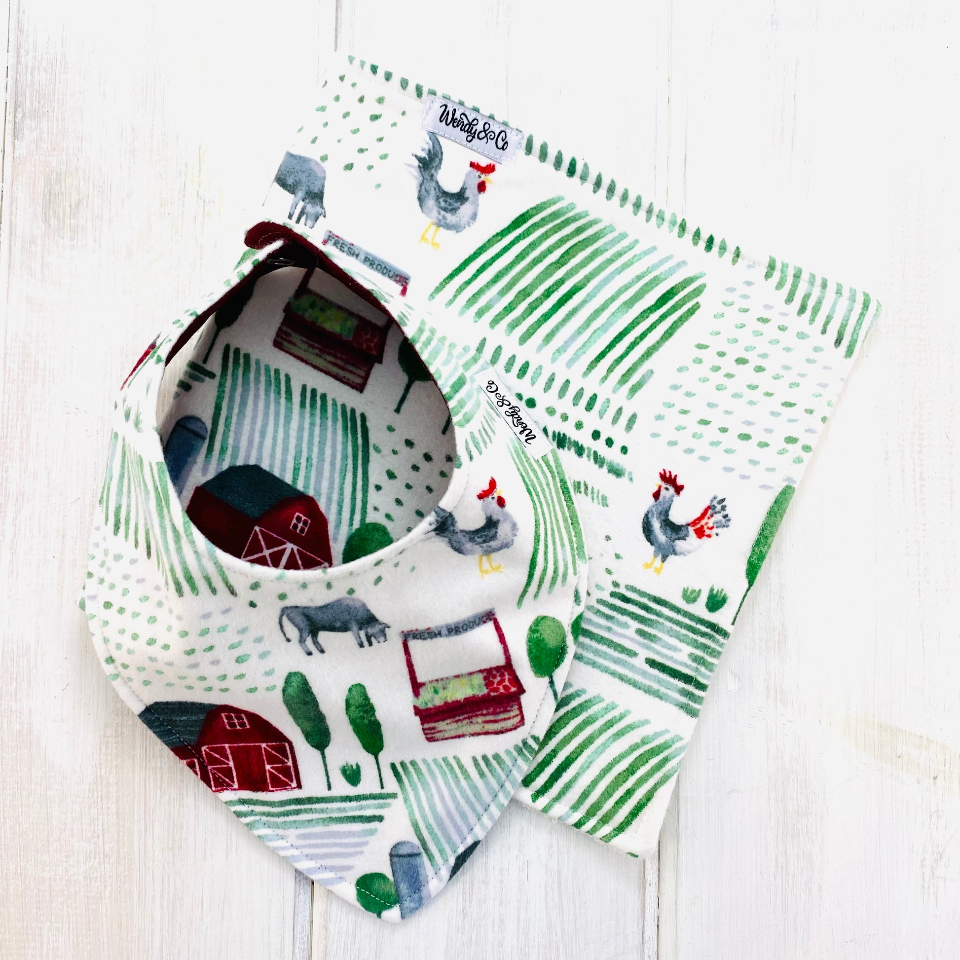 Sustainable burp cloth in super soft farm print with matching bib.