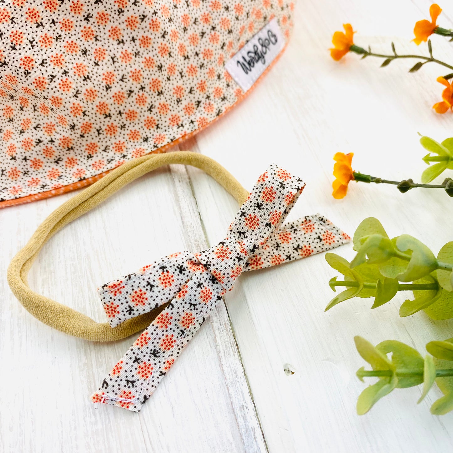 Coral Ditsy Baby Bow