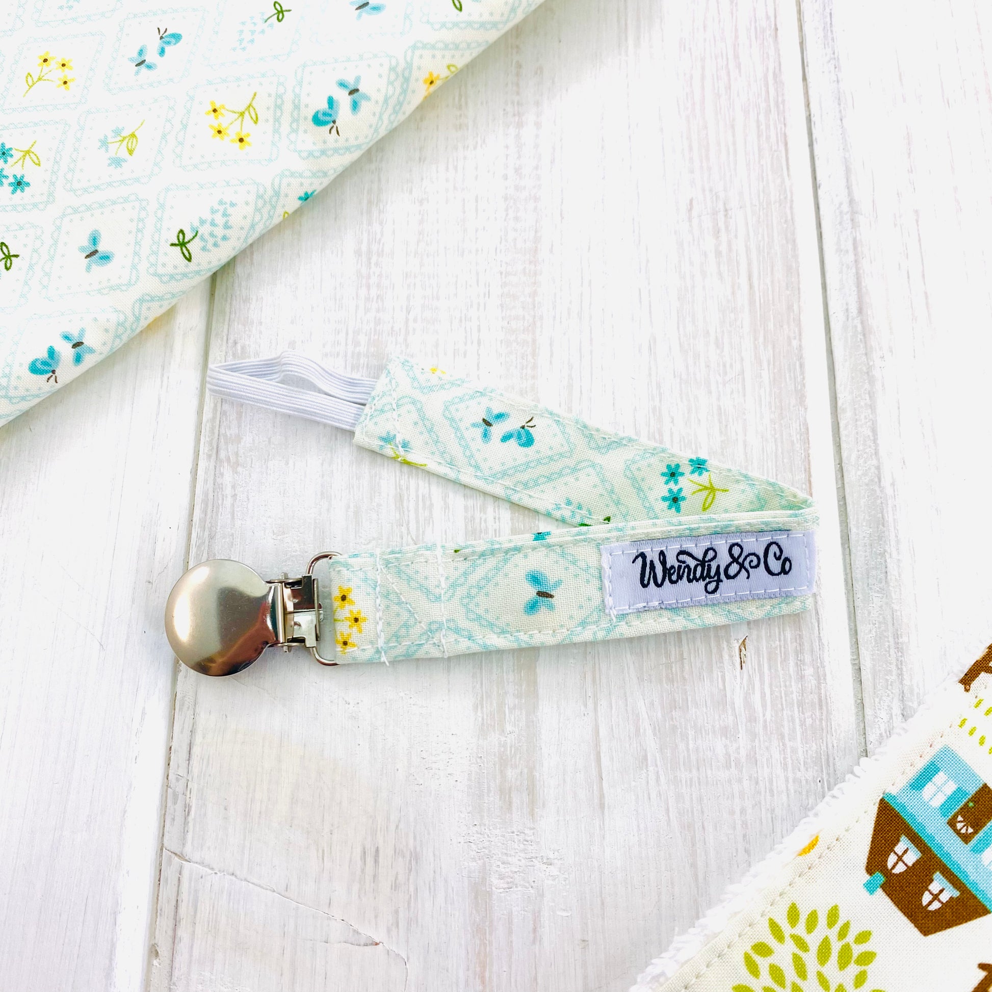 Spring floral pacifier clip.
