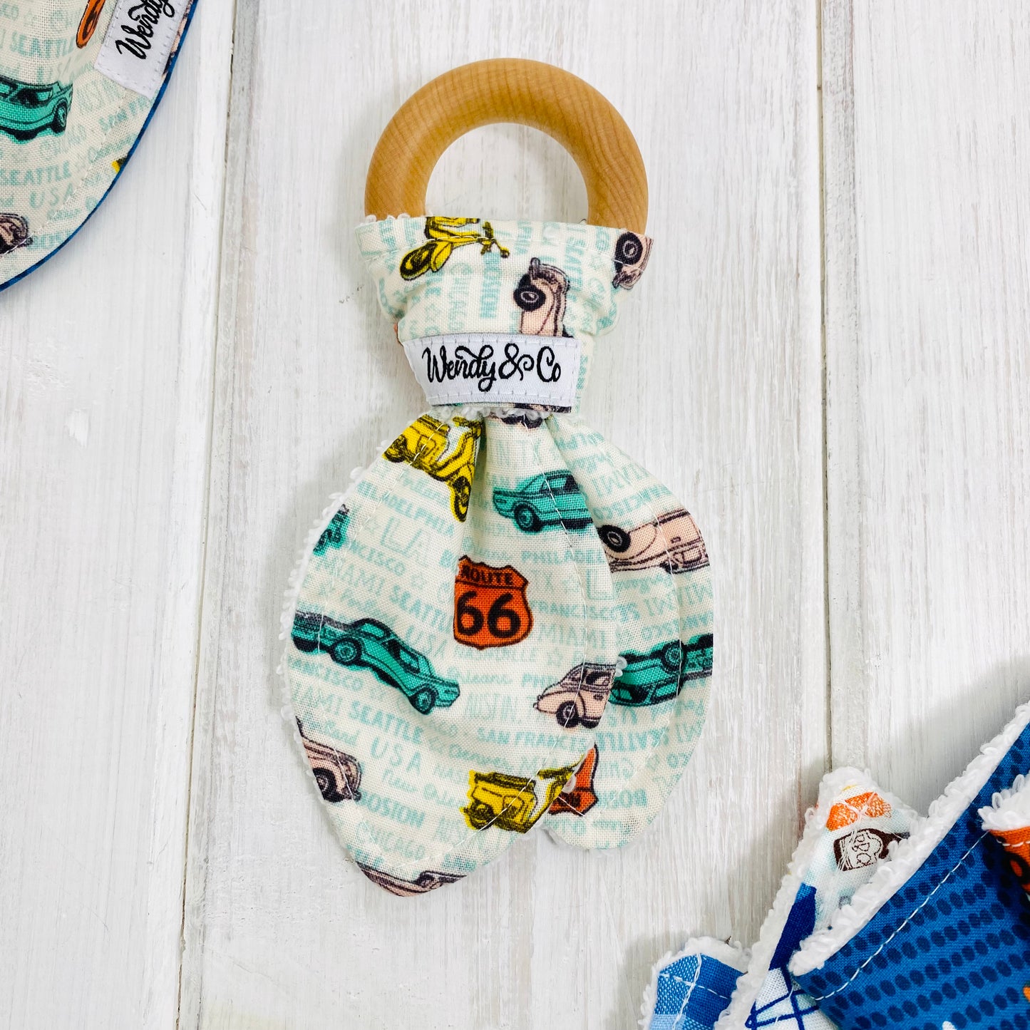 Mint green, orange, yellow, tan, old cars classic cars, scooter print fabric- handmade teether with maple wood ring and fabric.