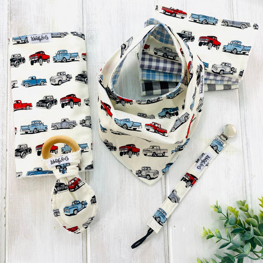 Baby gift set with classic trucks print.