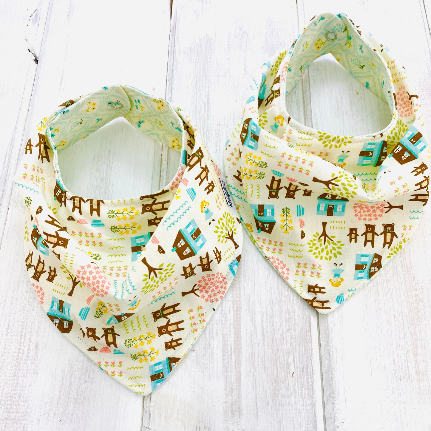 Reversible bandana baby bib, handmade, with beautiful scene- Goldilocks and the three bears.