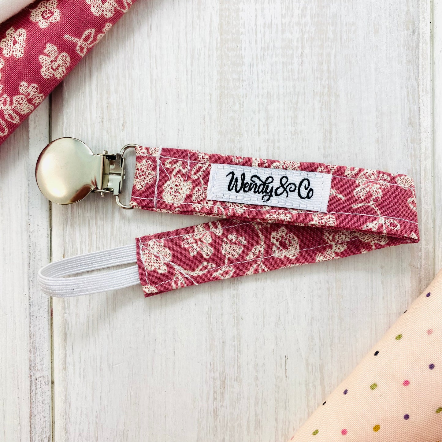 Pink floral pacifier clip, soother holder.