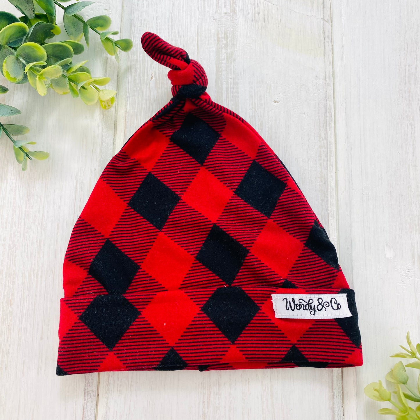Black and red check super soft infant beanie.