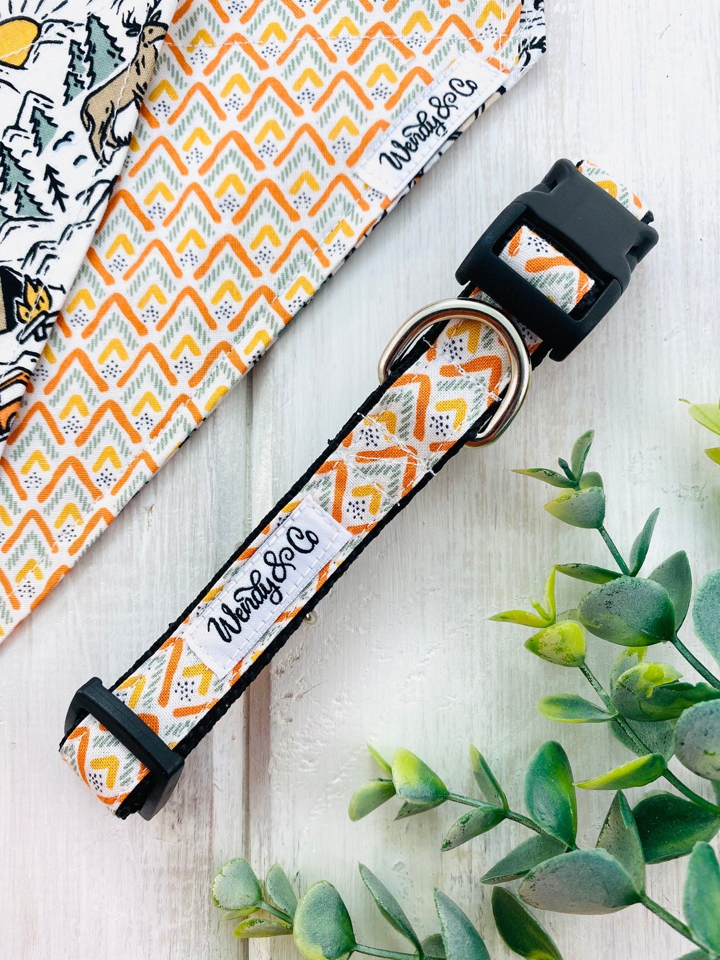 Orange and olive mountain scene on large dog collar.