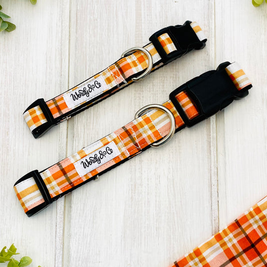 Warm orange and brown plaid dog collars in medium and large.
