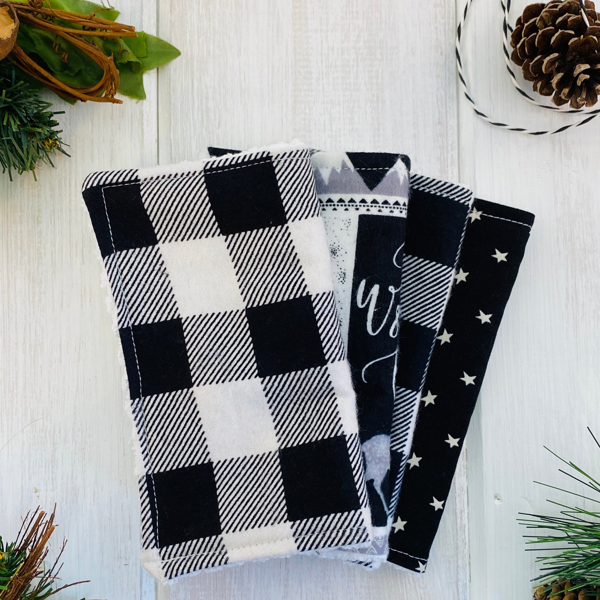 Set of 4 baby washing cloths, sustainable, reusable. Shown in classic black and white buffalo check.