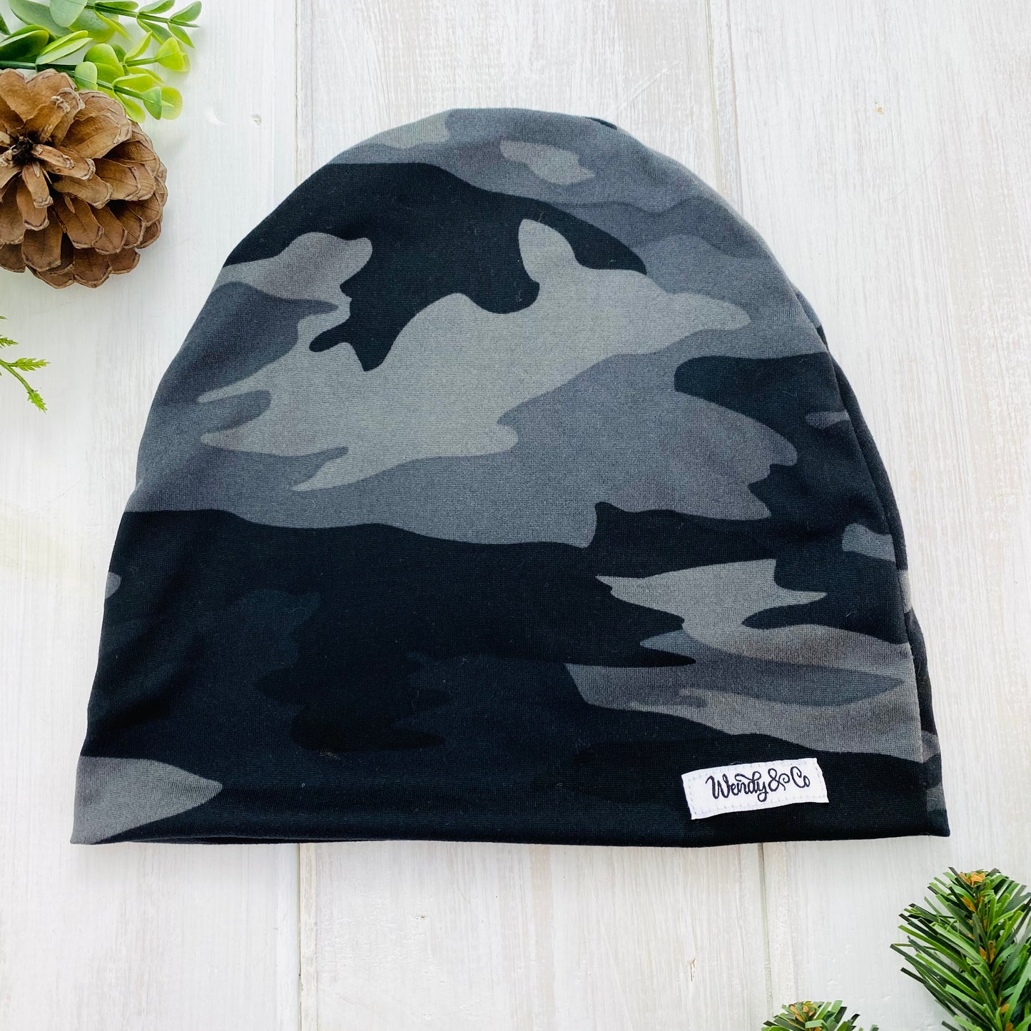 Buttery soft beanie in gray camo print.