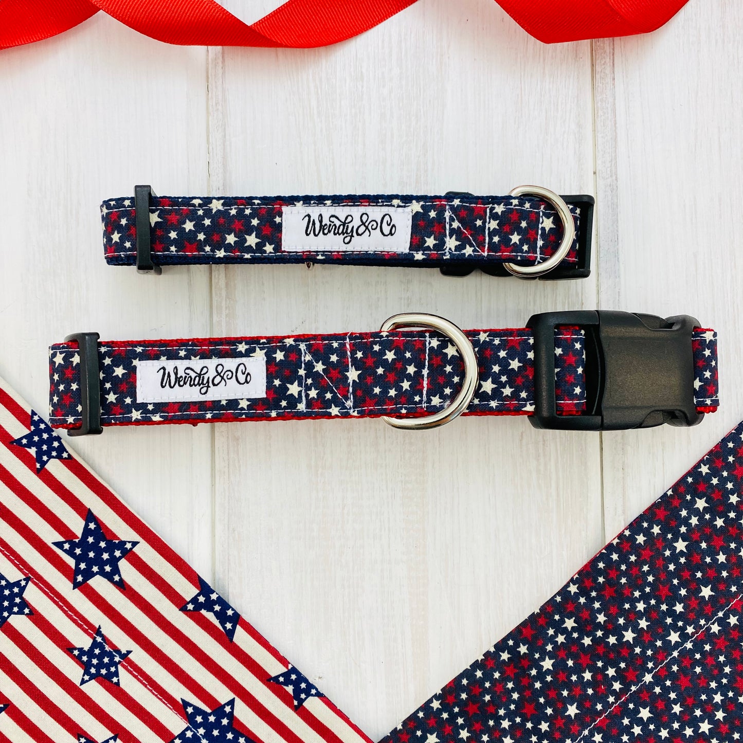 Our matching dog collars- red webbing with navy fabric covered in cream and red stars.